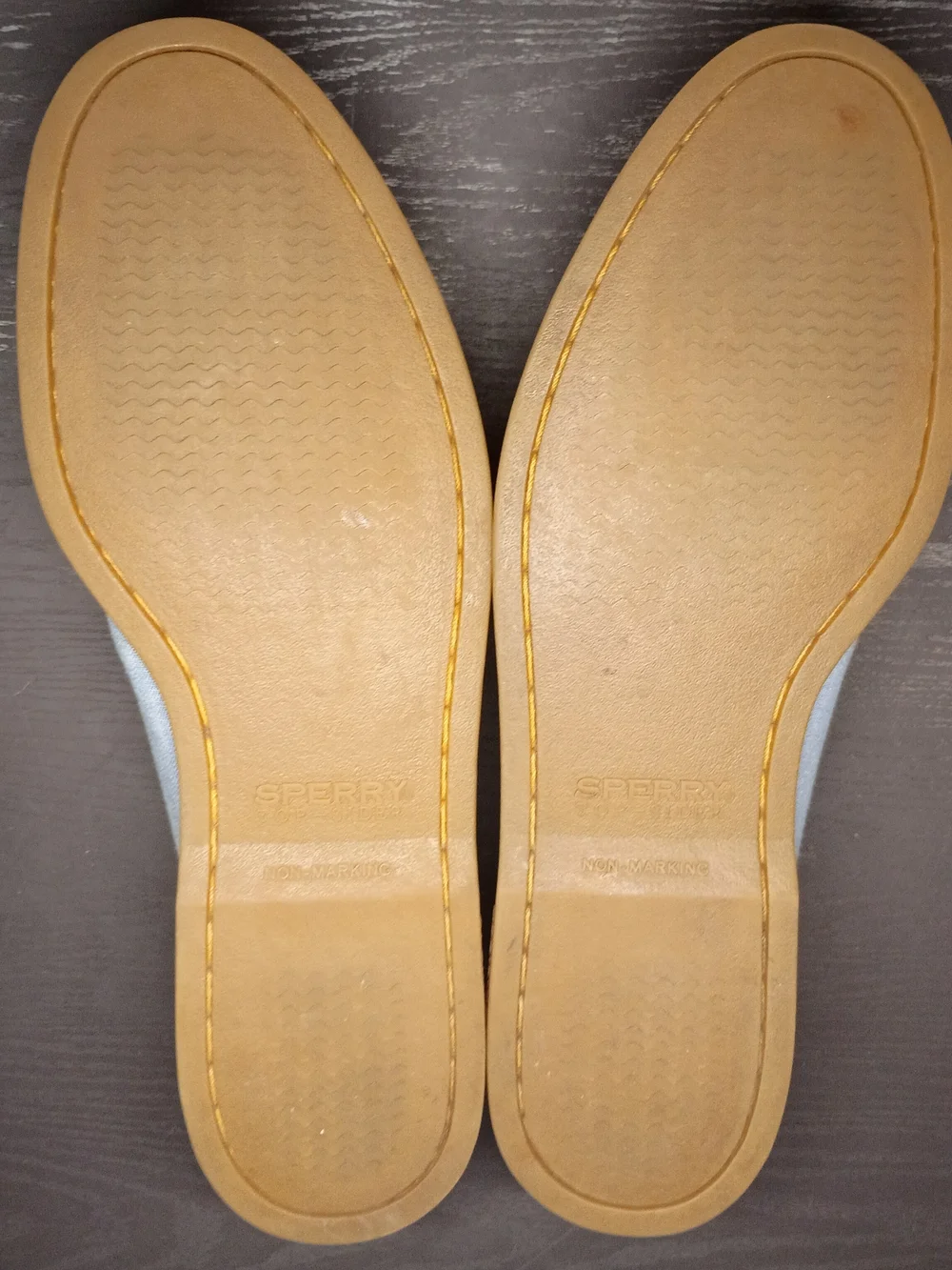 Sperry Men's 9.5M Powder Blue Canvas Boat Shoes with Tan Soles.